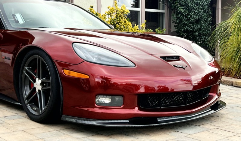 Candy burgundy Chevrolet Corvette Z06 wrapped by Obsidian Wrapz